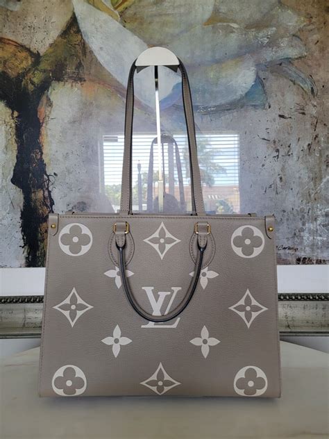 louis vuitton onthego mm dove/cream monogram empreinte